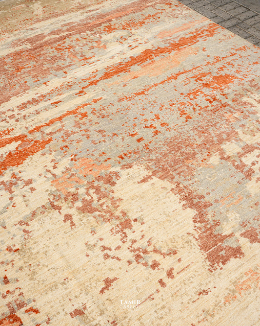 Angled view of rust, terracotta and grey strokes on the Abstract Rust & Beige rug