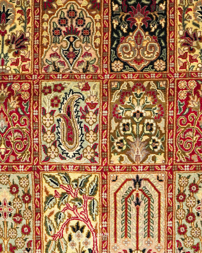 Close-up of paisley, cypress and floral panels on the Bakhtiari Black rug