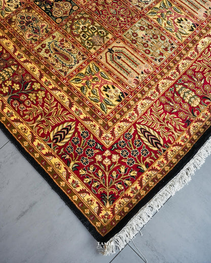 Red and gold border with fringe on the handmade Bakhtiari Black rug