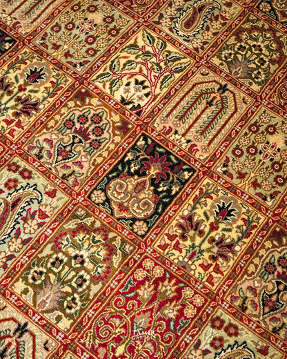Detail of floral and tree motifs in the Bakhtiari Black Persian rug