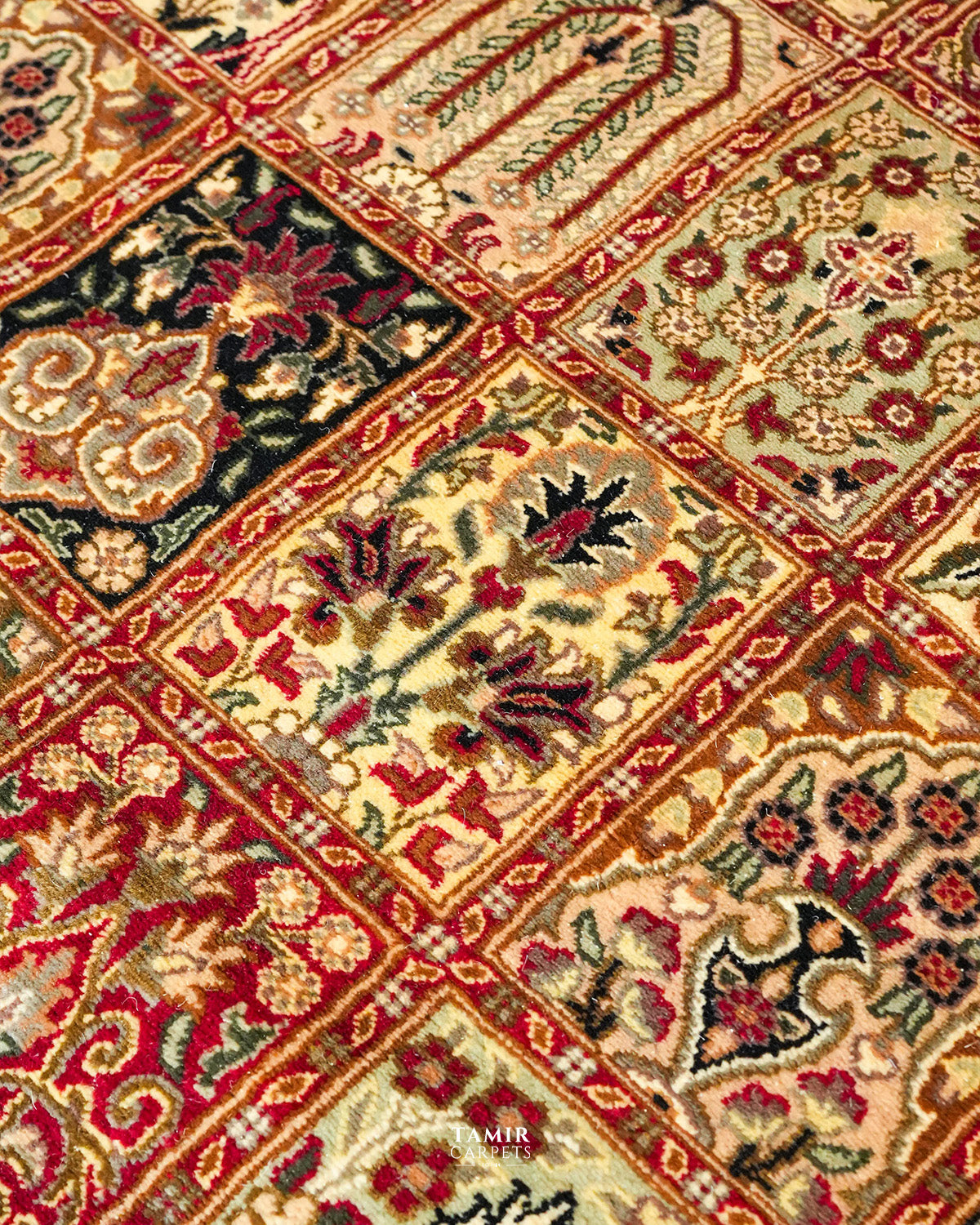 Close-up of the wool pile and organic-dyed colours of the Bakhtiari Black rug