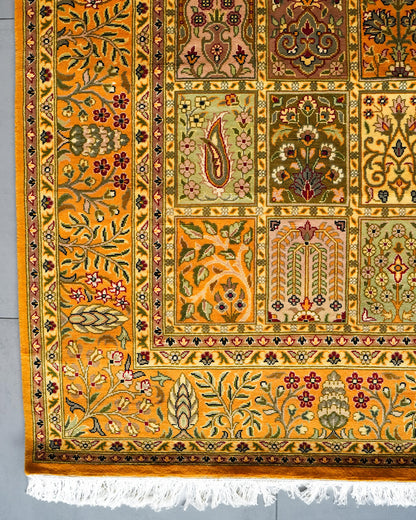 Corner border and white fringe of the Bakhtiari Mustard 6x9 Persian rug