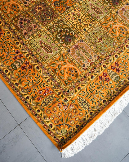 Floral border and fringe detail of the handmade Bakhtiari Mustard rug