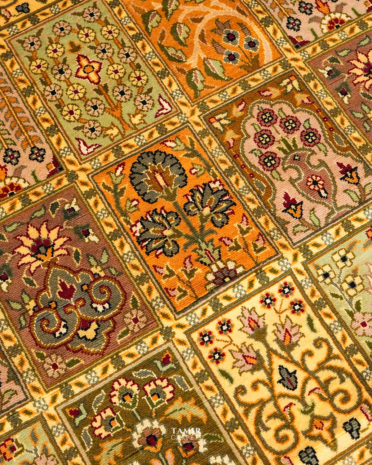 Close-up of floral motifs in the Bakhtiari Mustard New Zealand wool rug