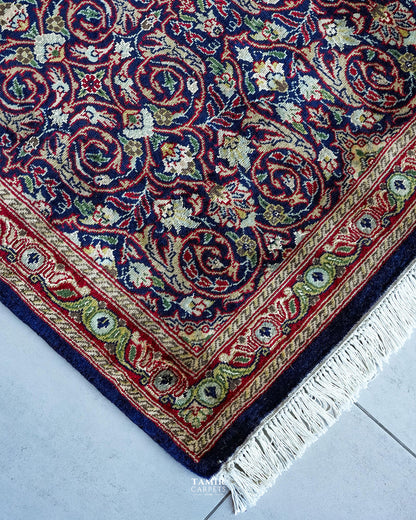 Corner of the Bakhtiari Runner showing the red and gold border with fringe