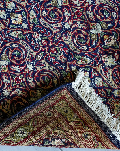 Folded corner showing the back weave of the single-knotted Bakhtiari Runner