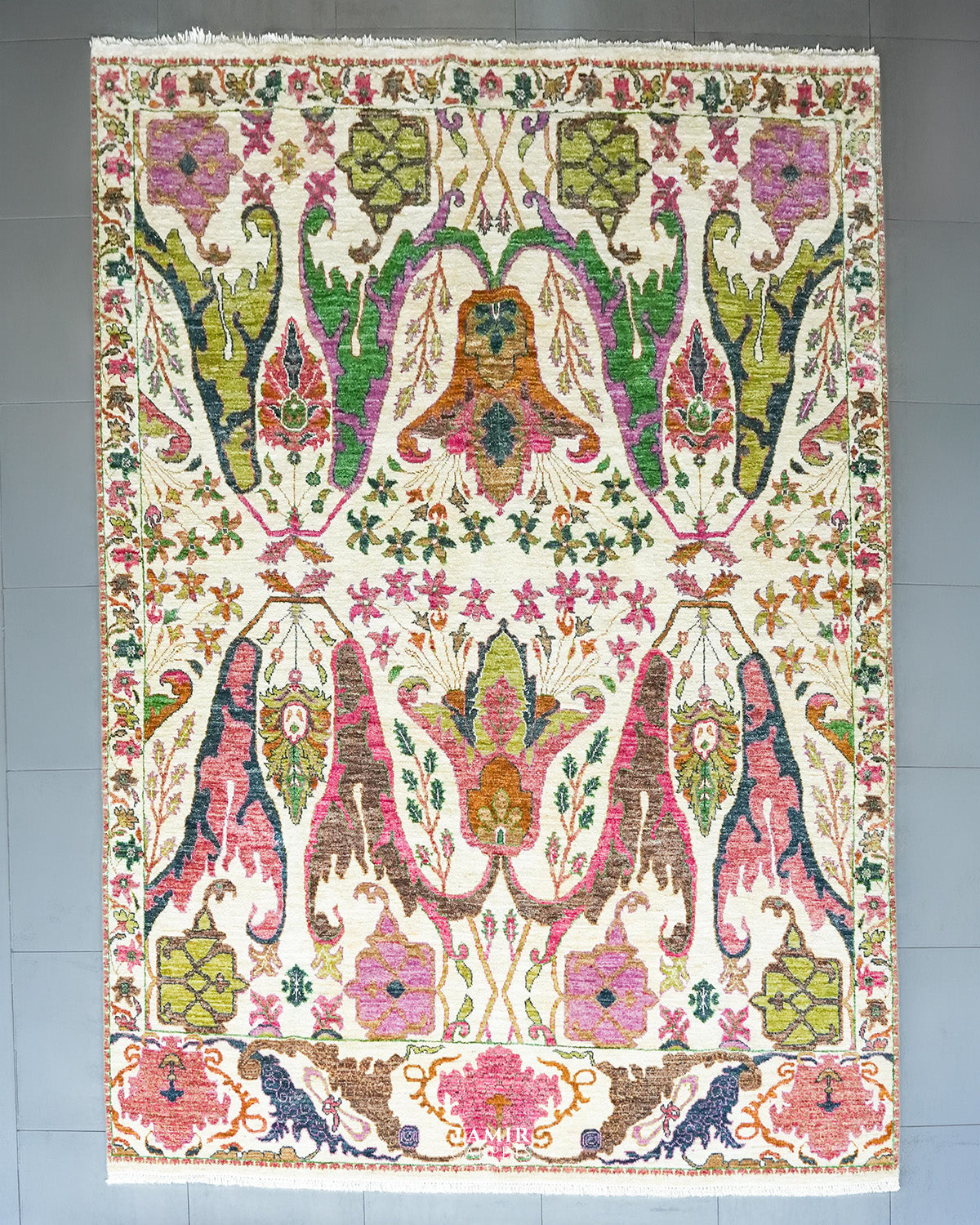 Bidjaar 9x12 ft handmade ivory wool rug with pink, green and navy floral palmettes, full view