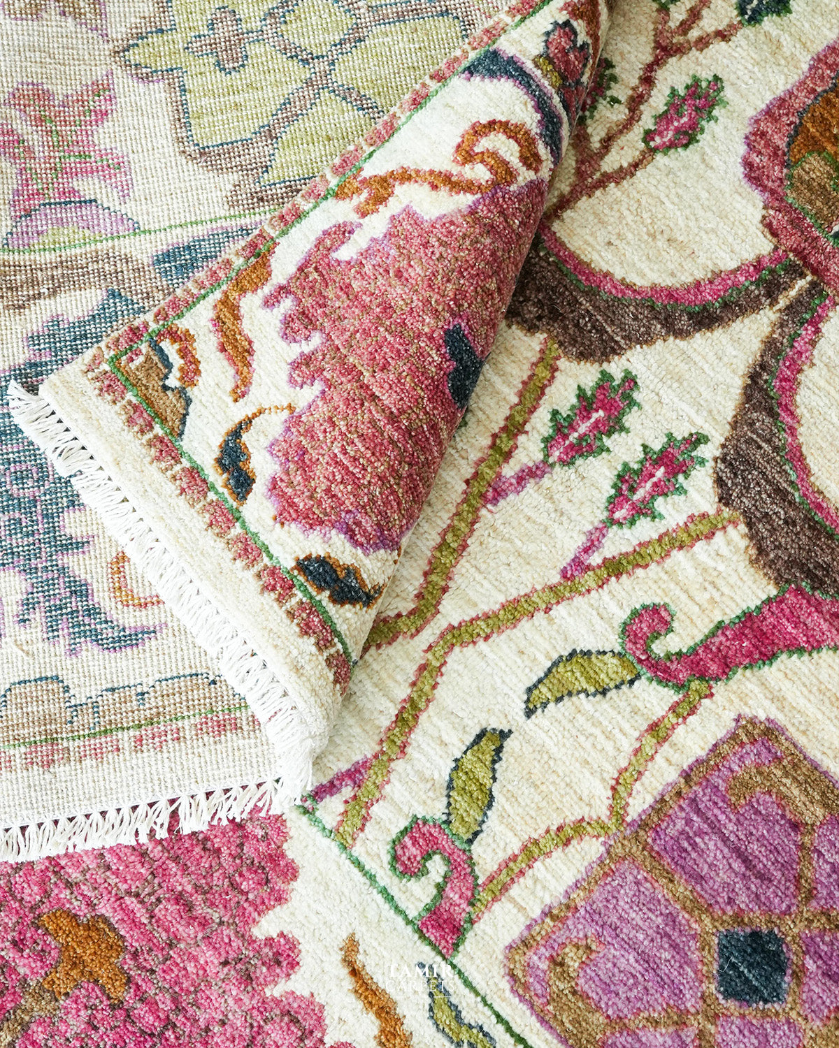 Bidjaar ivory floral wool rug partial view highlighting natural dye colours