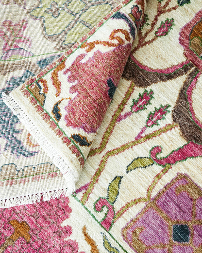 Bidjaar ivory floral wool rug partial view highlighting natural dye colours