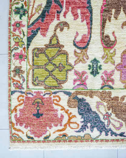 Bidjaar 9x12 rug angled view showing ivory field and multi-band floral border