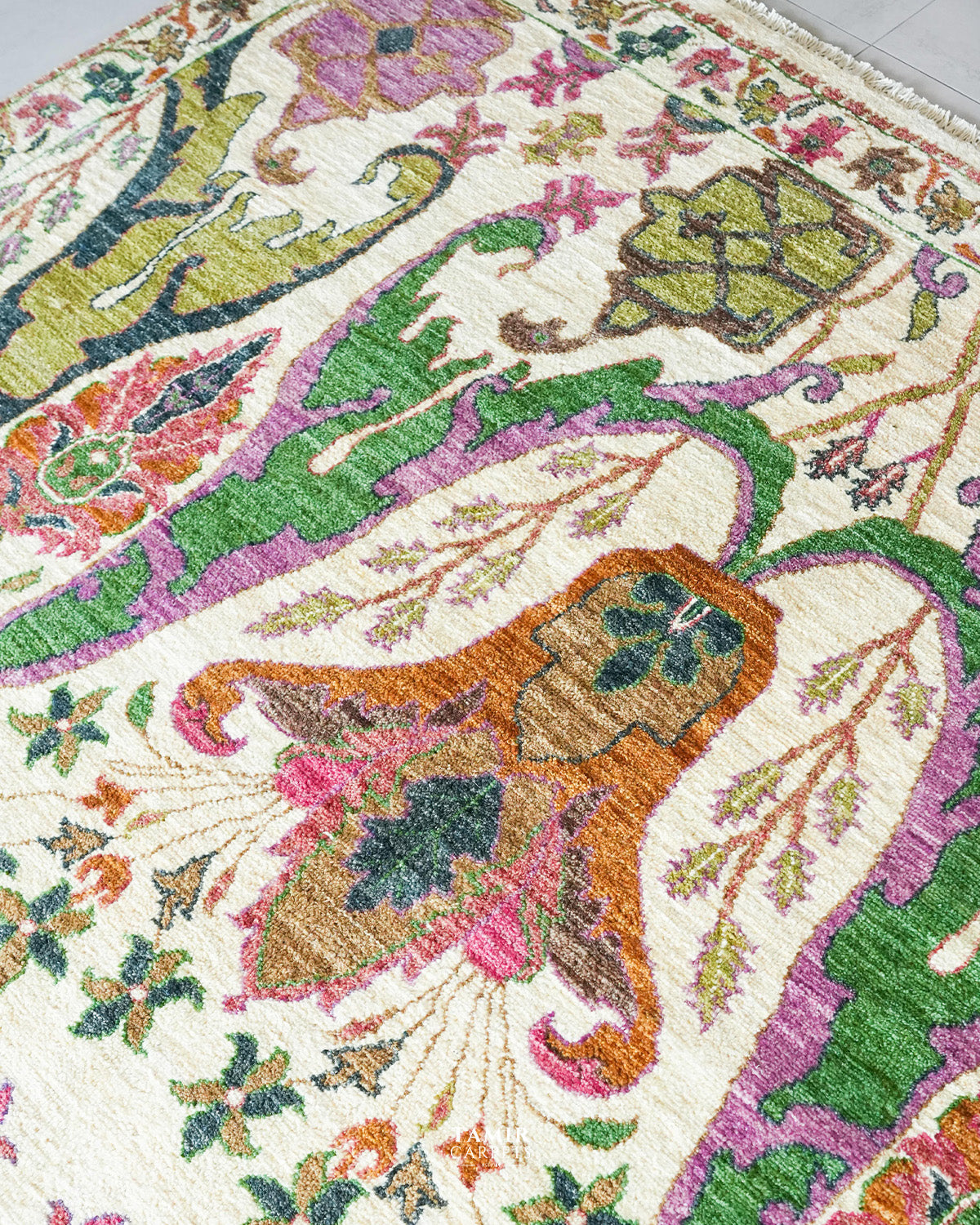 Bidjaar rug floral medallion detail in brown, orange and pink tones
