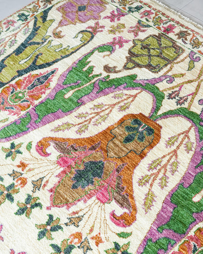 Bidjaar rug floral medallion detail in brown, orange and pink tones
