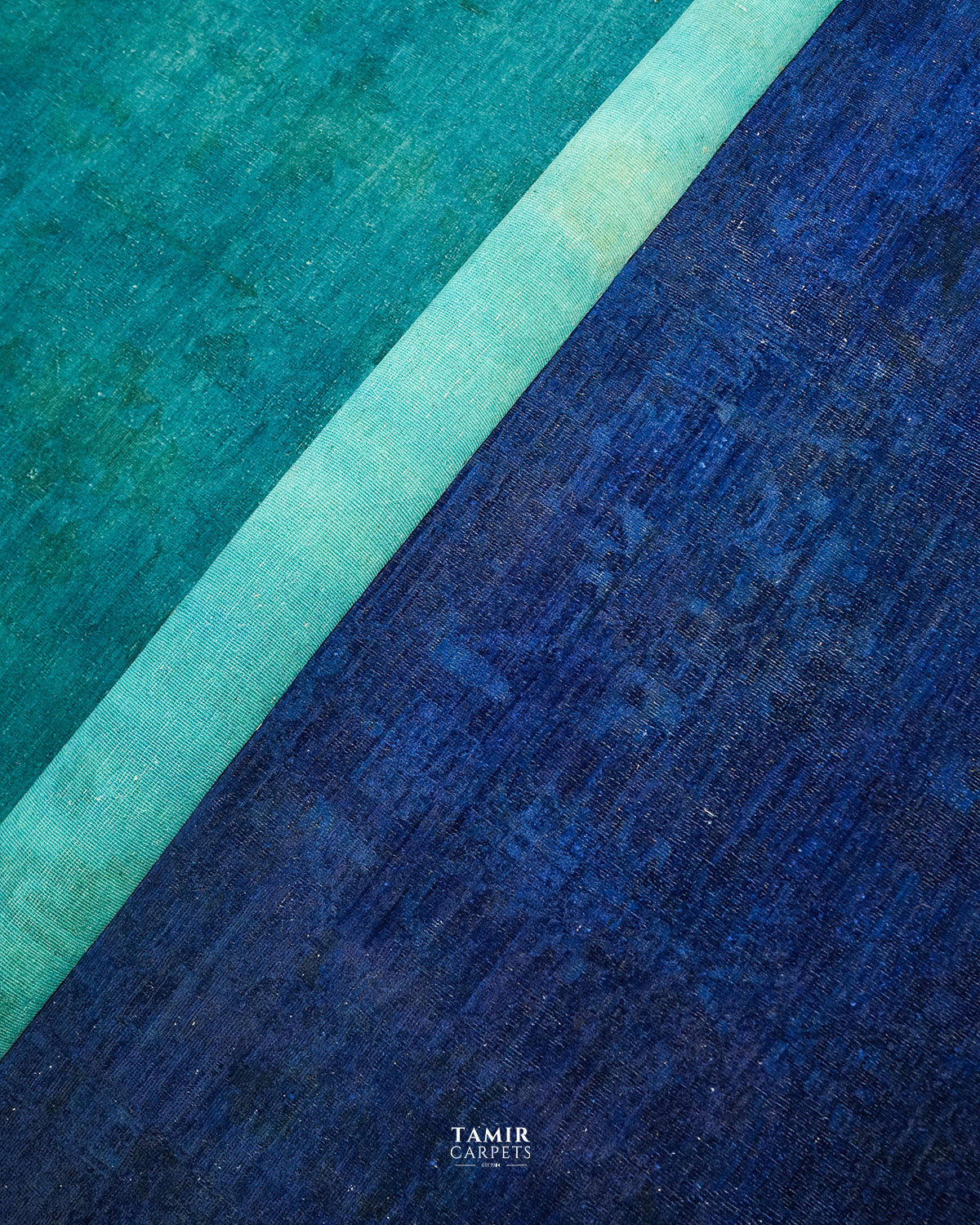 Detail of the overdyed blue texture on the Chobi Afghan rug