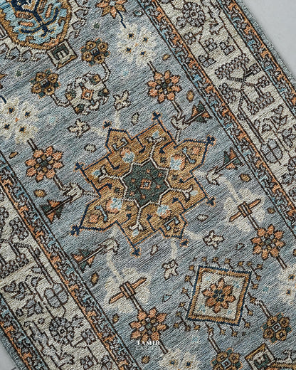 Angled view of the Afghan floral motifs on the 2.5x10 Chobi Runner