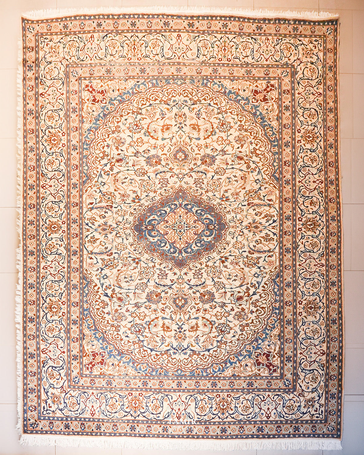 Ispahan Persian wool rug 9x12 ft, full view of the ivory and blue medallion design