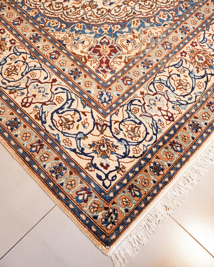 Angled corner view of the handmade Ispahan 9x12 rug with fringe