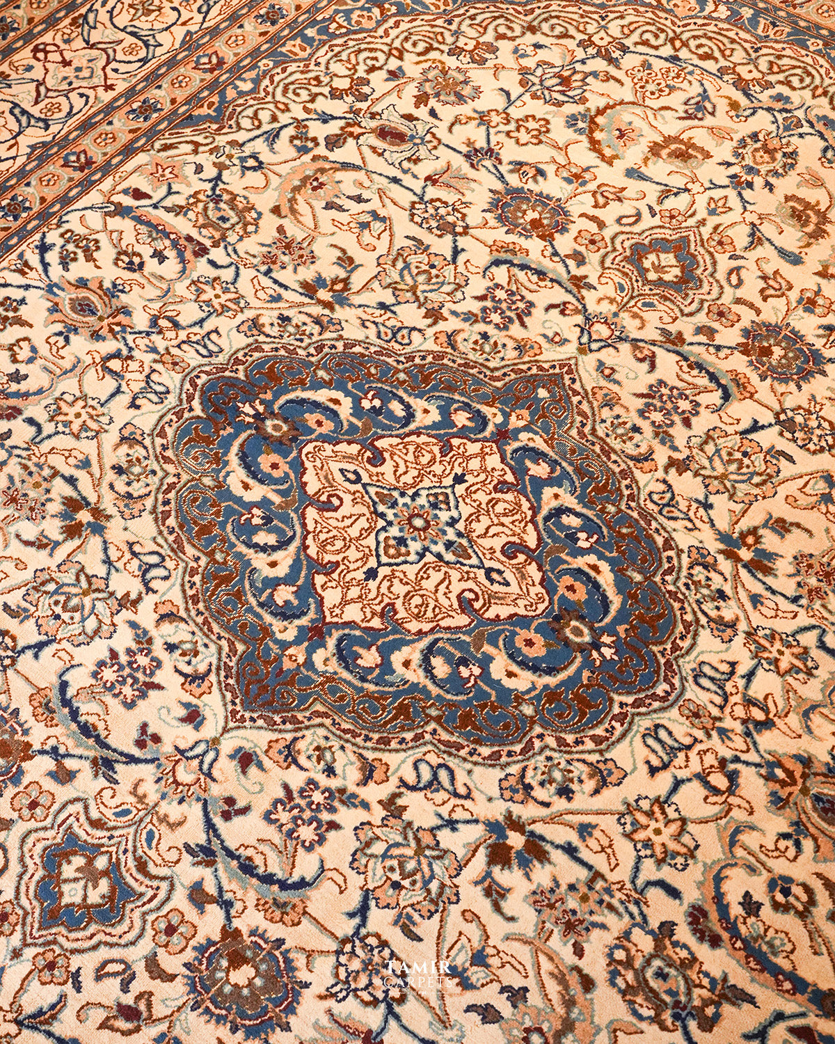 Blue and rust central medallion of the Ispahan Persian rug
