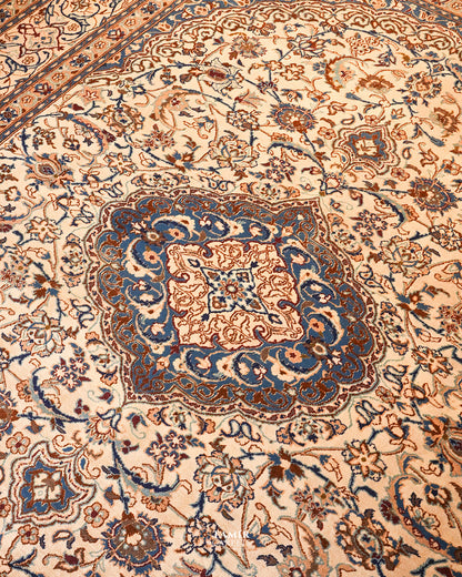 Blue and rust central medallion of the Ispahan Persian rug