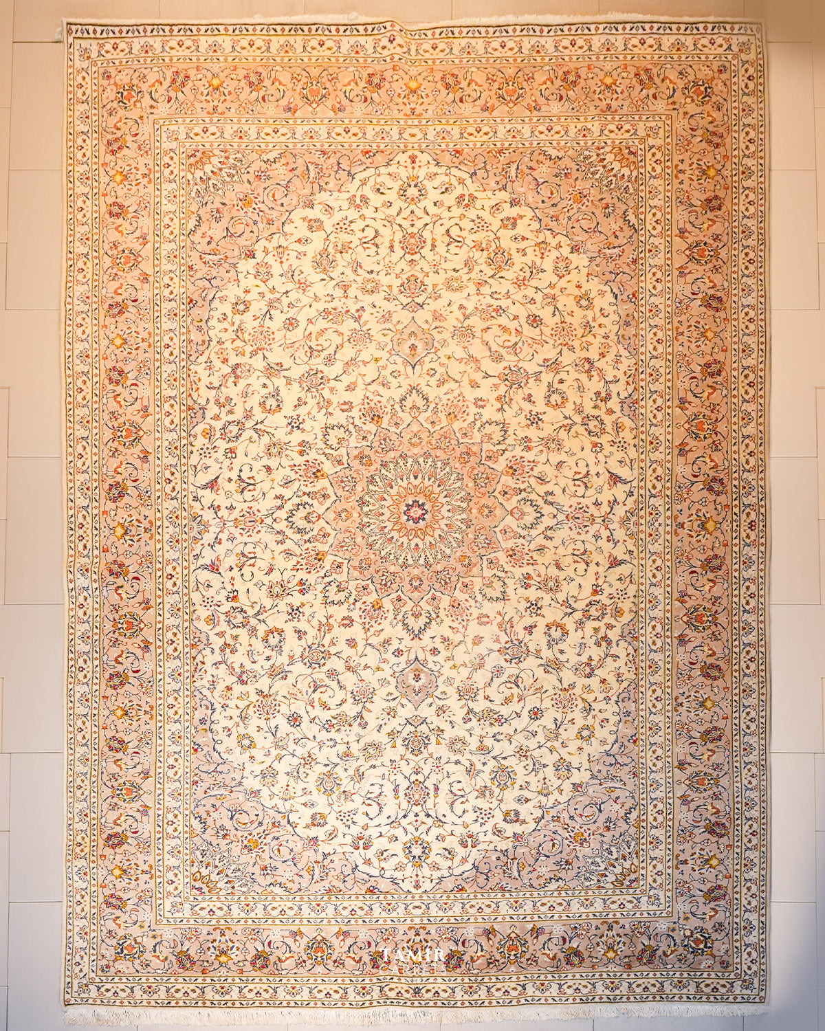 Kashaan Persian wool rug 9x12 ft, full view of the ivory medallion design