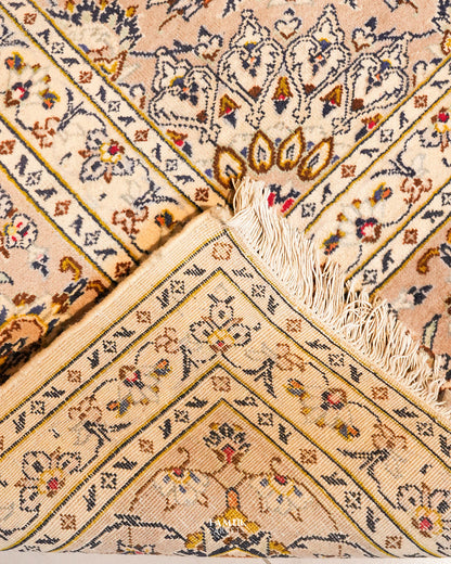 Folded corner showing the back weave of the double-knotted Kashaan rug