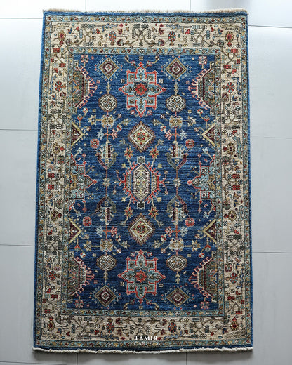 Kazaak Afghan wool rug 4x6 ft, full view of the blue tribal design