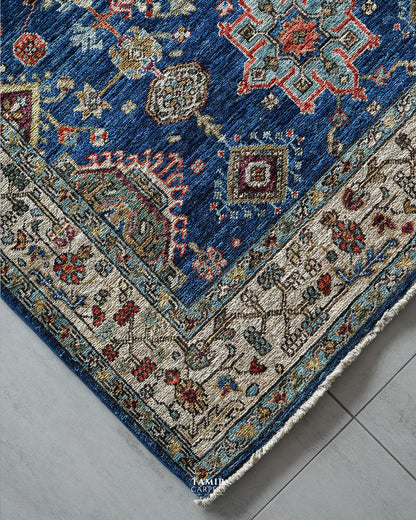 Angled corner view of the handmade Kazaak Afghan rug