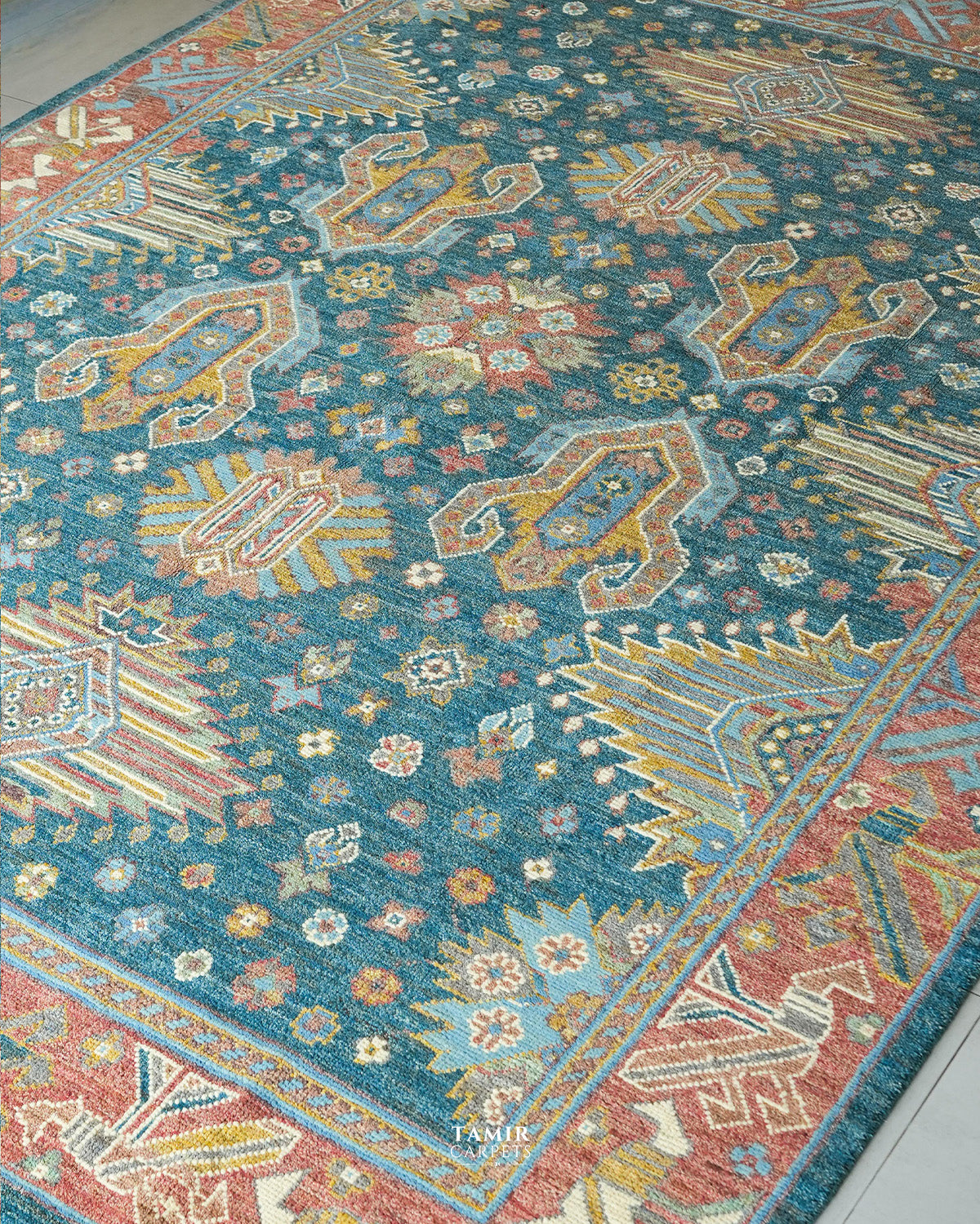 Angled view of the handmade 9x12 Oushak rug's medallion pattern