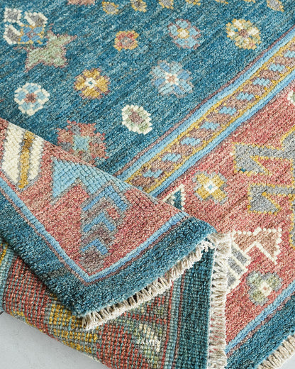 Rolled edge showing the thick organic handspun wool pile