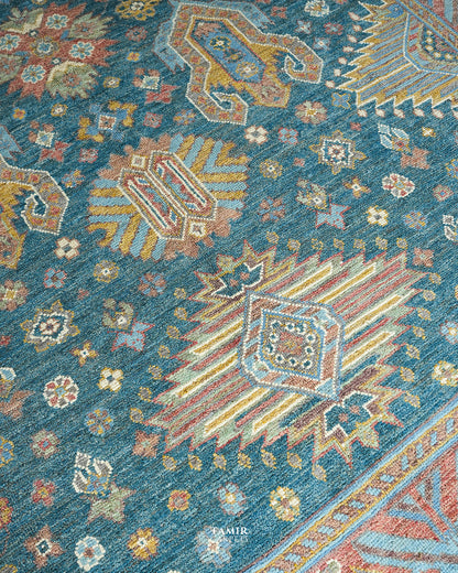 Close-up of the central geometric medallion in organic-dyed wool