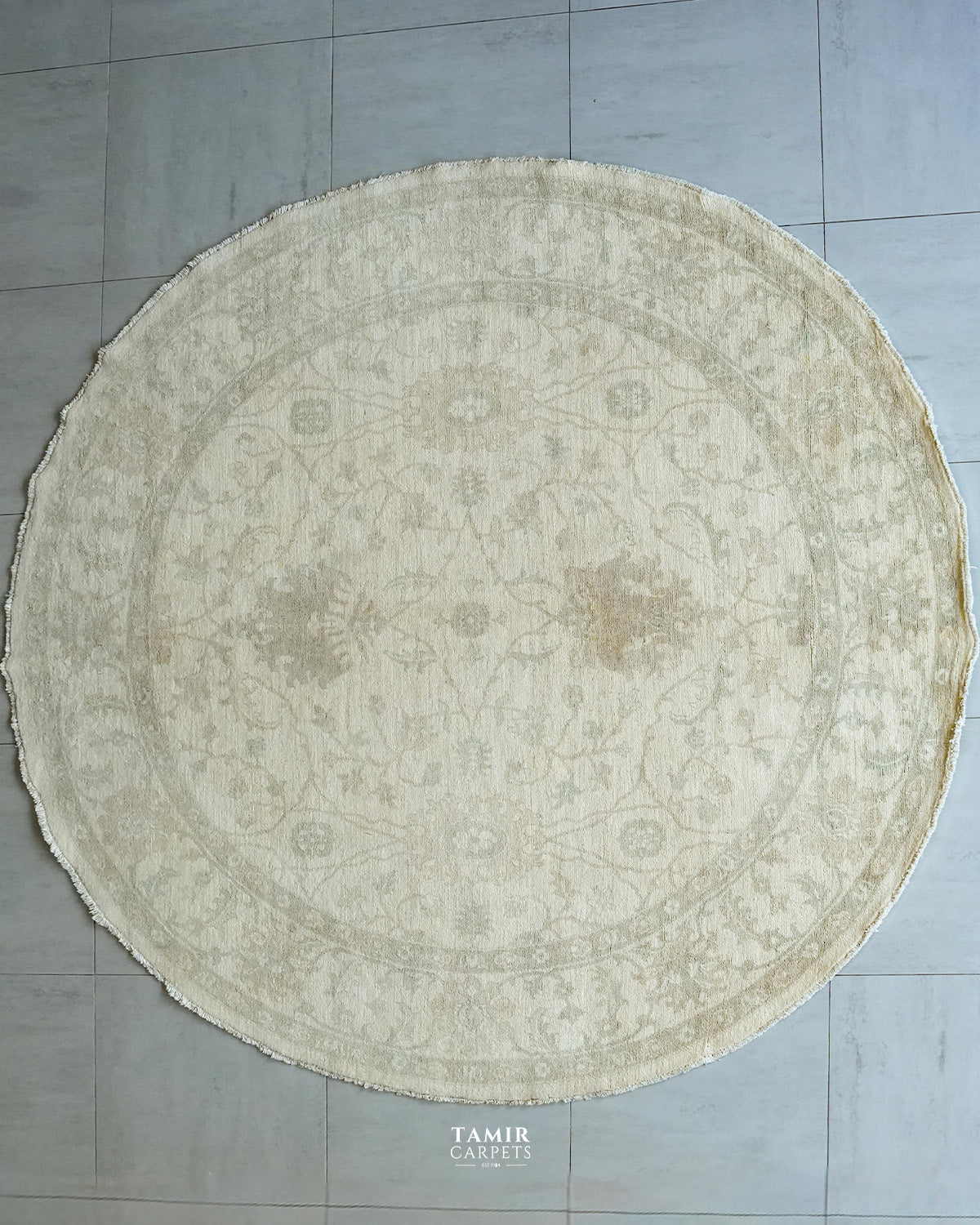 Round Oushak Afghan wool rug 8x8 ft, full view of the ivory floral design