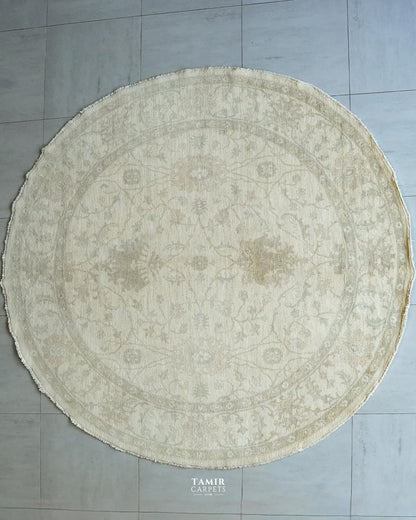 Round Oushak Afghan wool rug 8x8 ft, full view of the ivory floral design