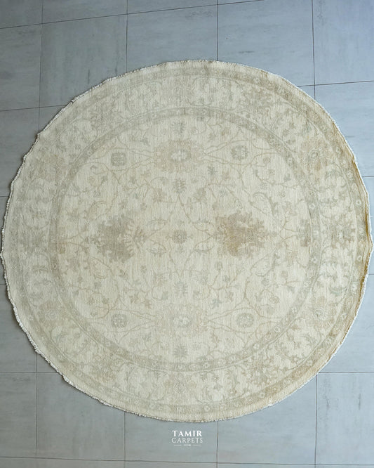 Round Oushak Afghan wool rug 8x8 ft, full view of the ivory floral design
