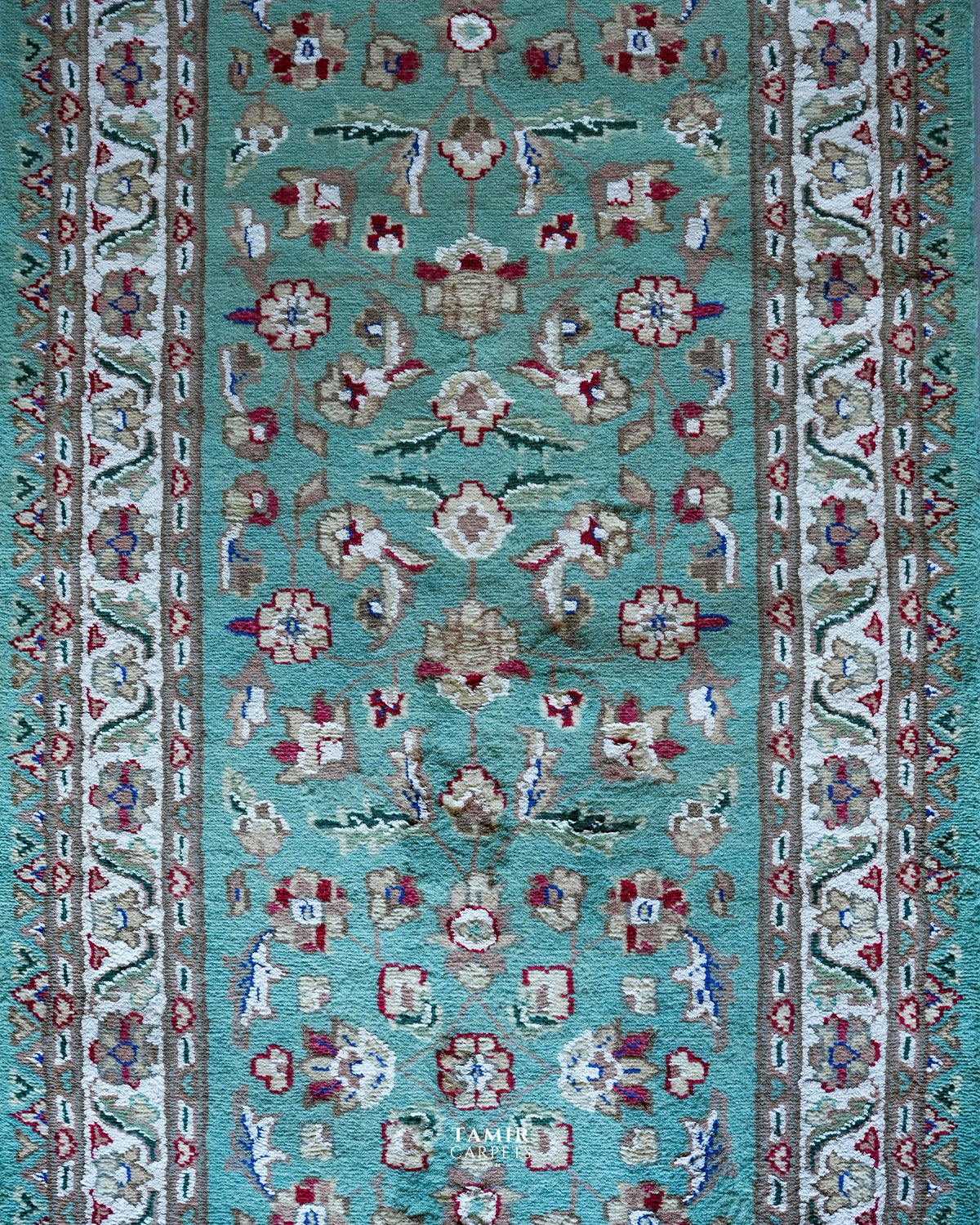 Top view of the floral field and border on the 2.5x10 runner