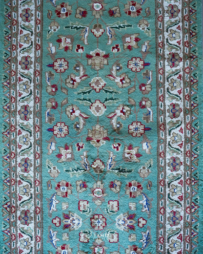 Top view of the floral field and border on the 2.5x10 runner