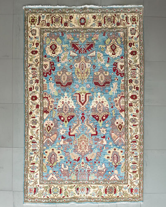 Sultanabad Afghan wool rug 6x9 ft, full view of the sky blue field and ivory border