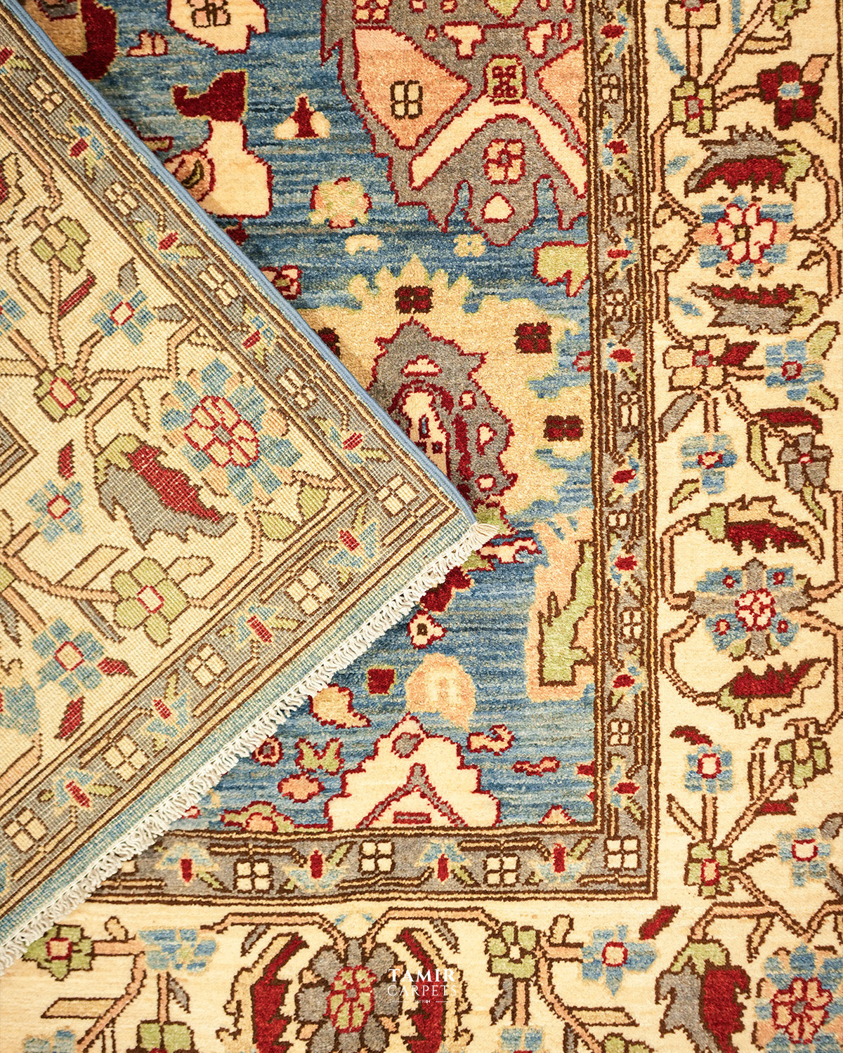 Folded corner with the reverse side of the handmade Sultanabad rug
