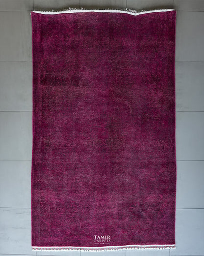 Vintage Overdyed Afghan wool rug 6x9 ft, full view in deep magenta