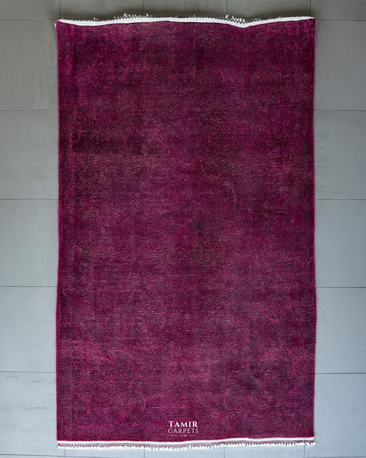 Vintage Overdyed Afghan wool rug 6x9 ft, full view in deep magenta