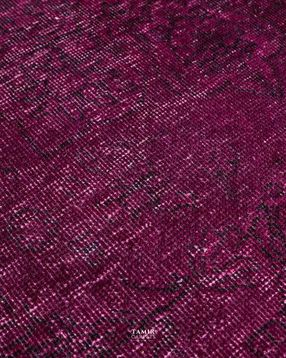Detail of the organic handspun wool pile in magenta overdye